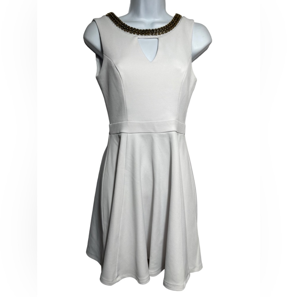 XOXO size small cute white‎ dress with gold embellishments and open back